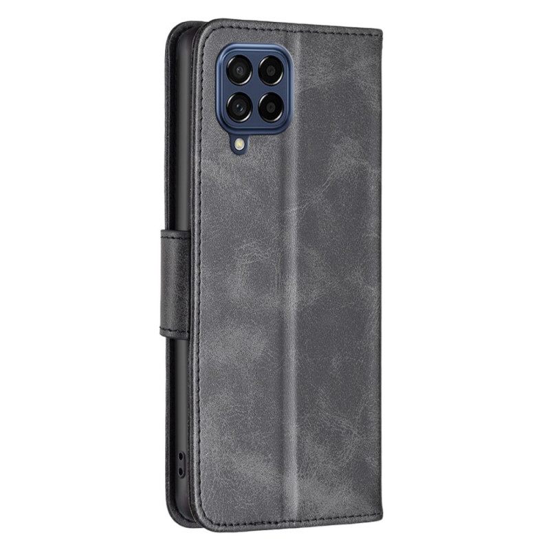 Θήκη Flip Samsung Galaxy M53 5G Λοξό Κούμπωμα Με Λουράκι