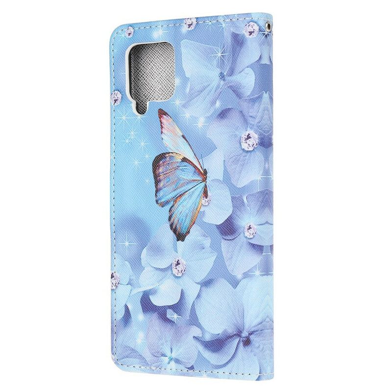 Θήκη Flip Samsung Galaxy A12 / M12 με κορδονι Πεταλούδες Με Λουράκι Διαμαντιών